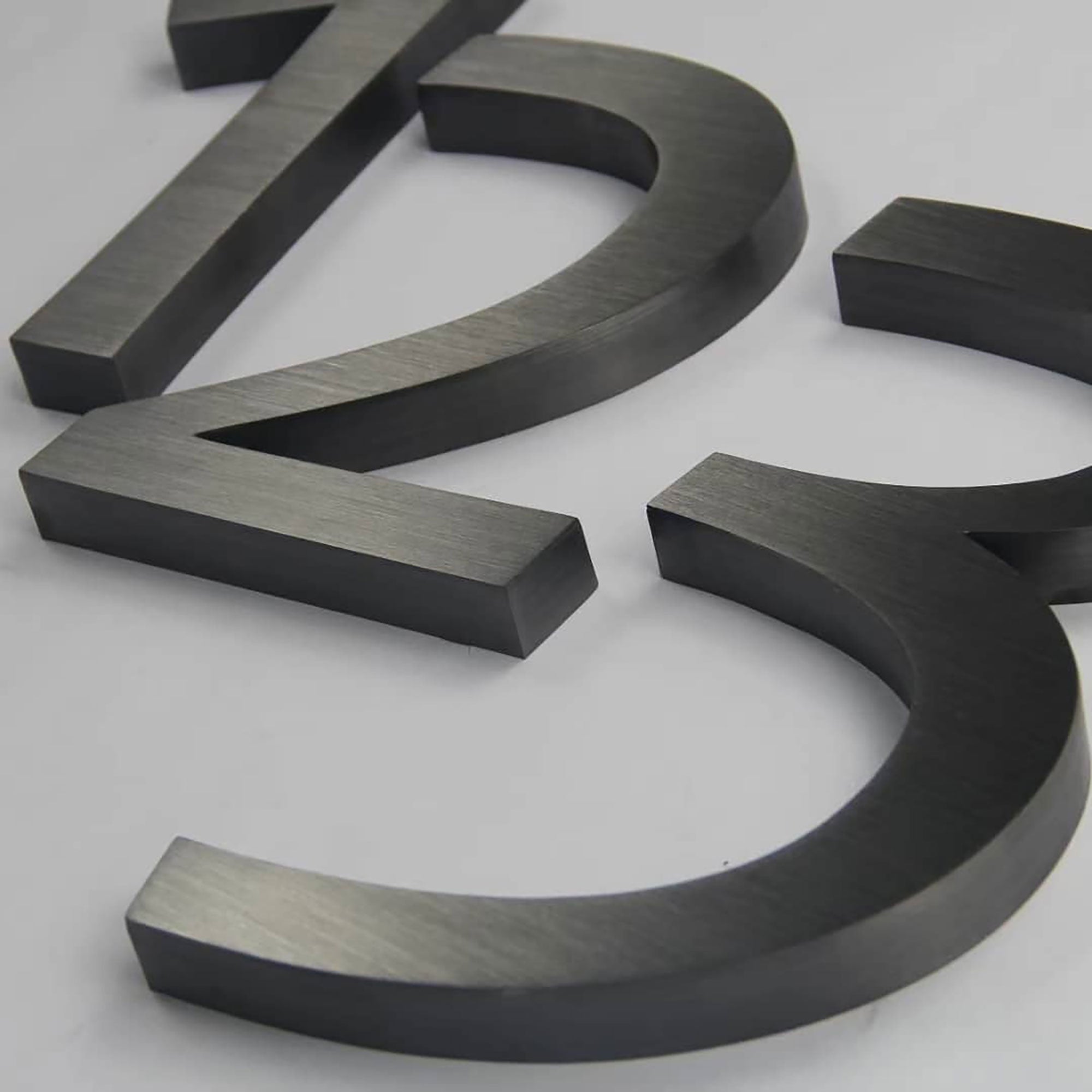 Brushed Stainless Steel Channel Letters – Dark or Black Oxidized Finish, Modern Industrial & Vintage Metal Effect Signage