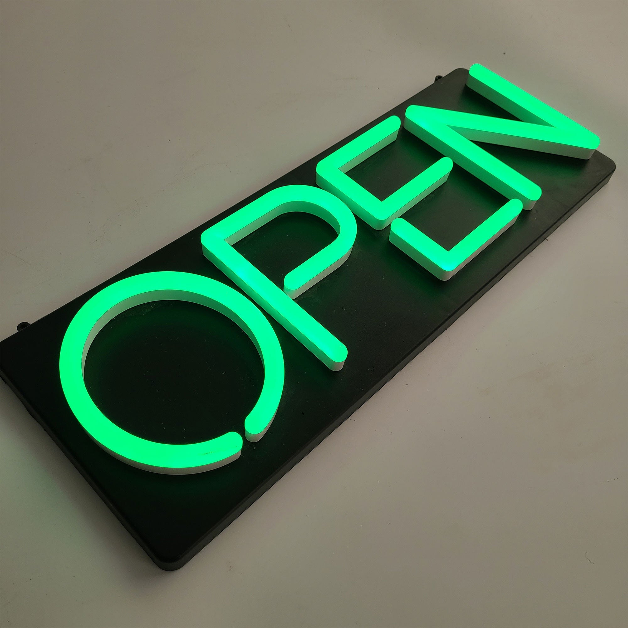 Custom Black Painted Light Box Sign – Wall Mounted LED Sign with Raised Green Acrylic Letters, 3D Illuminated Business Signage for Storefront, Office, Restaurant & Retail Branding Main image