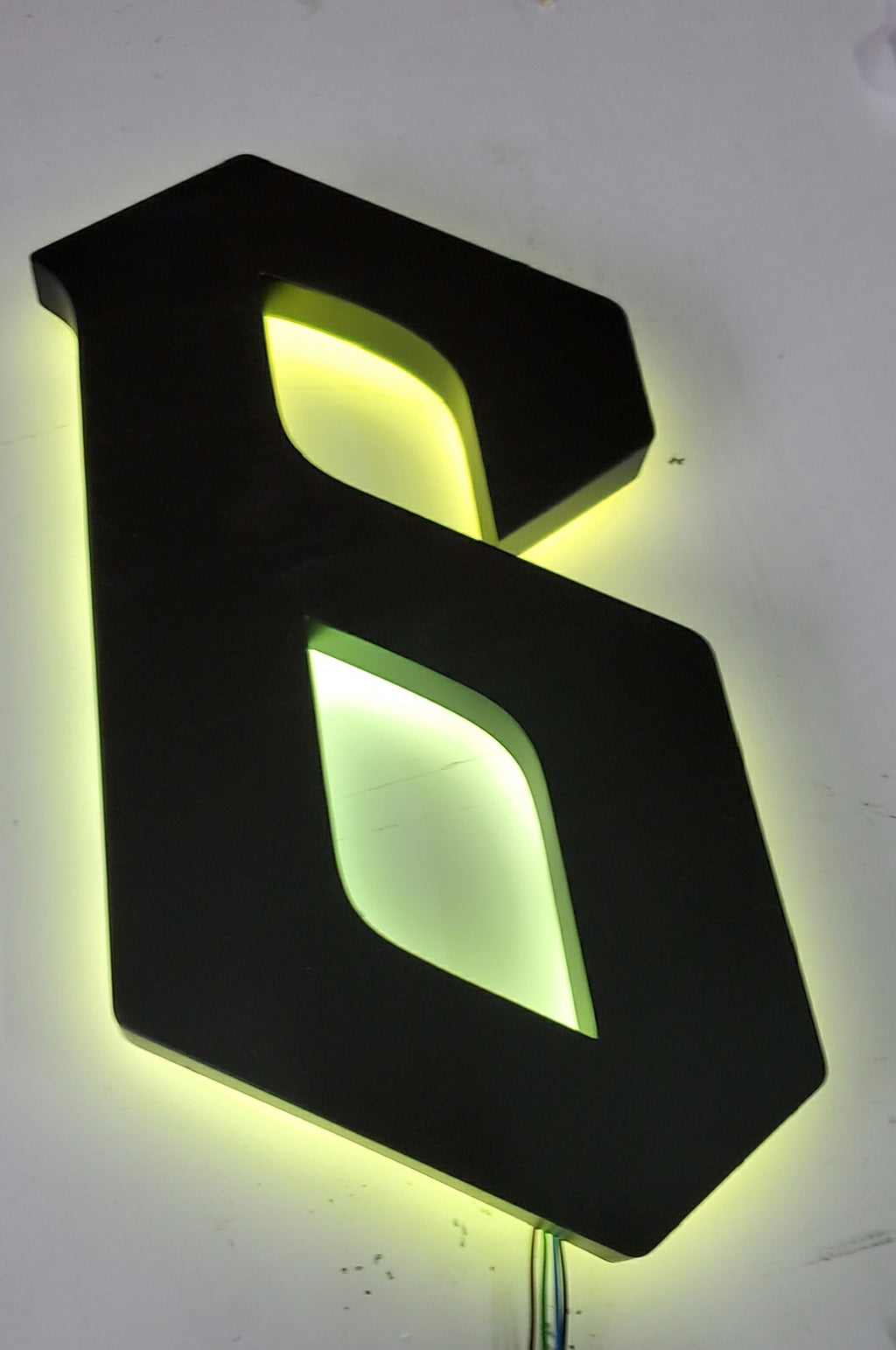 Custom Black Stainless Steel RGB Halo Lit LED Channel Letters – Backlit Sign for Storefront