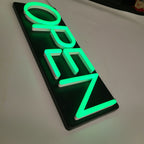 Custom Black Painted Light Box Sign – Wall Mounted LED Sign with Raised Green Acrylic Letters, 3D Illuminated Business Signage for Storefront, Office, Restaurant & Retail Branding